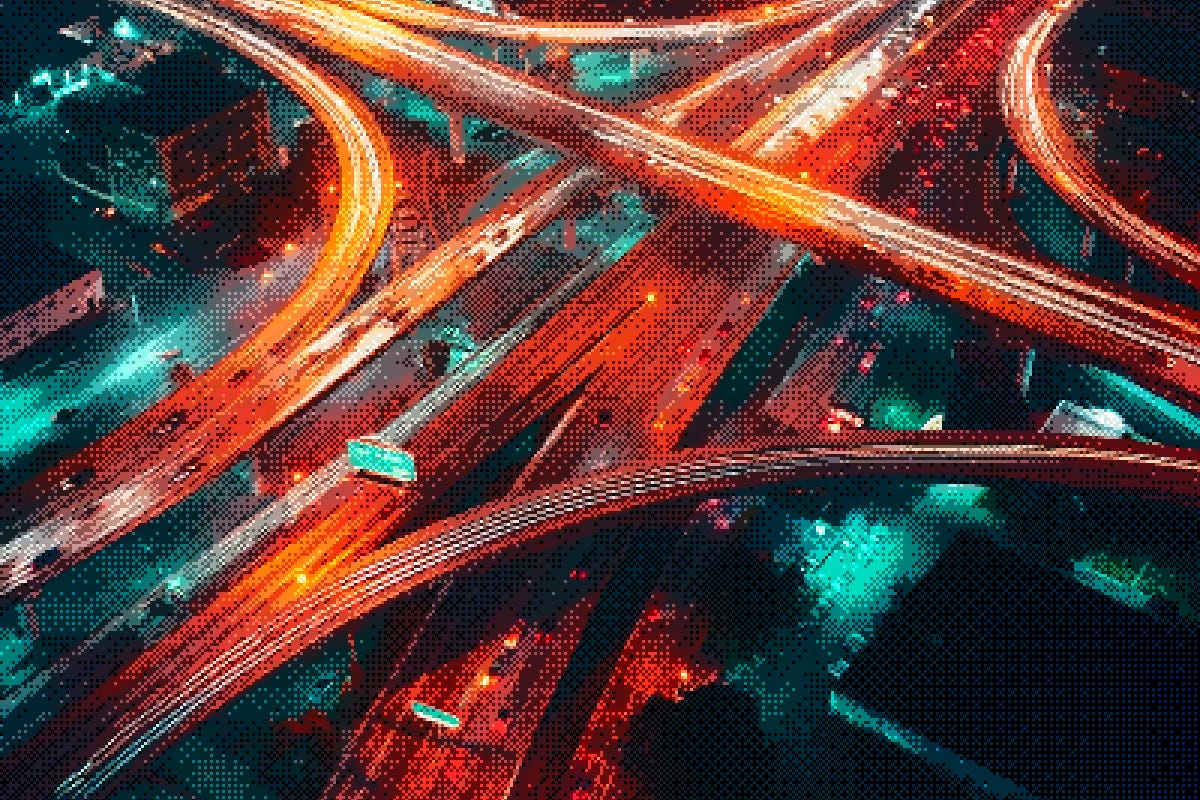A busy road interchange at night, looked from above A busy road interchange at night, looked from above