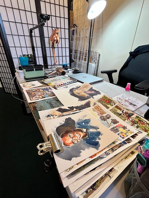 Photo of Dog portraits hung on the wall of the artist Jo Scotts Studio