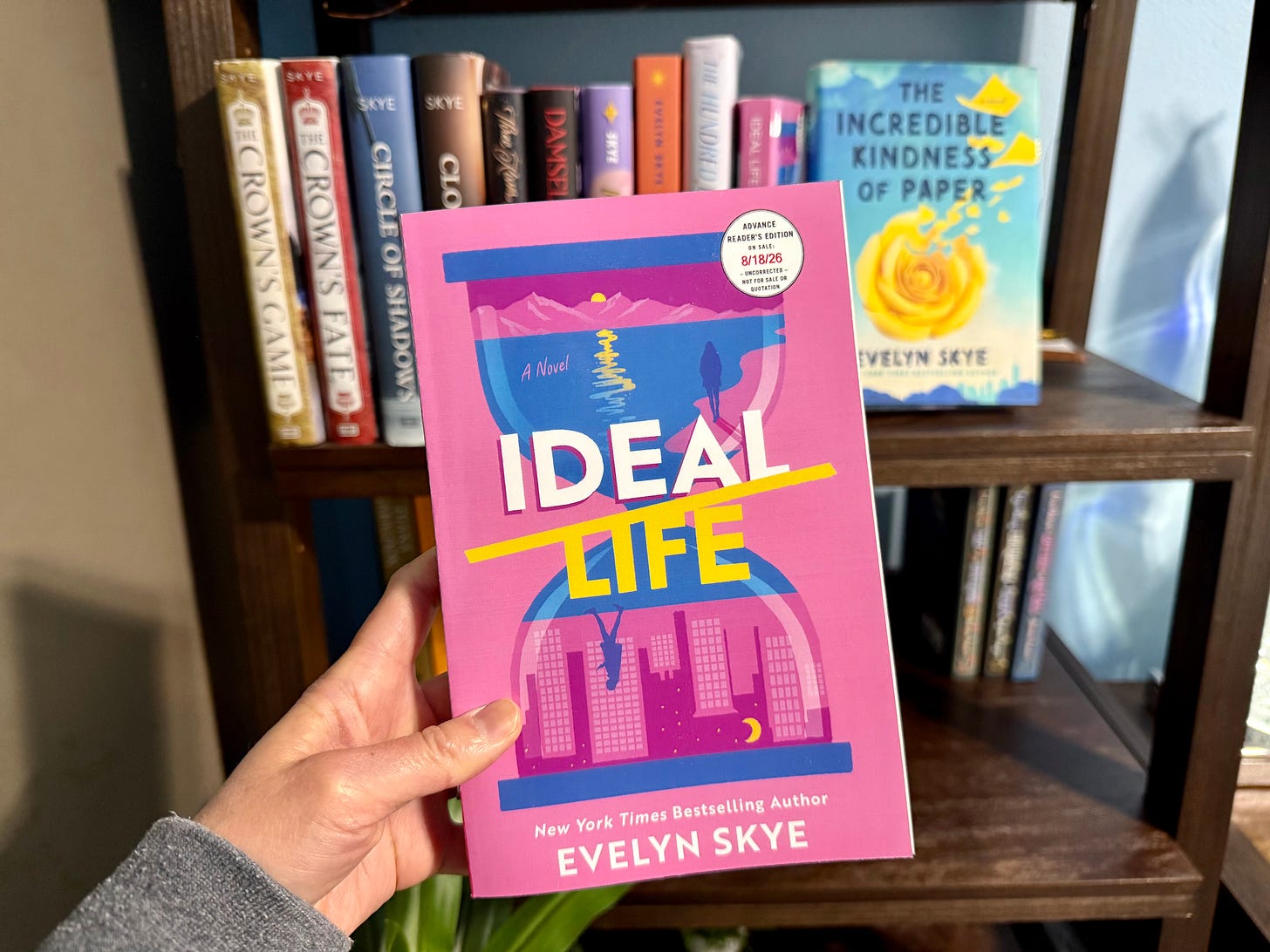 front cover of IDEAL LIFE ARC with hourglass illustration and a woman at the beach in the top half, and a woman in the city in the bottom half front cover of IDEAL LIFE ARC with hourglass illustration and a woman at the beach in the top half, and a woman in the city in the bottom half