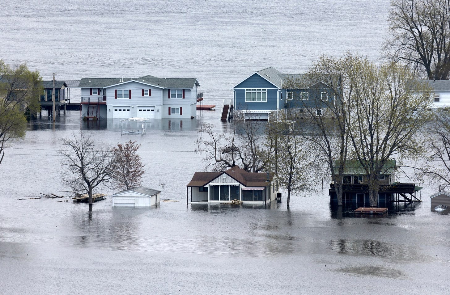 The flooded Mississippi River surrounds the homes on Abel Island near Guttenberg, Iowa, on Tuesday, April 25, 2023. (Stephen Gassman/Telegraph Herald via AP) The flooded Mississippi River surrounds the homes on Abel Island near Guttenberg, Iowa, on Tuesday, April 25, 2023. (Stephen Gassman/Telegraph Herald via AP)