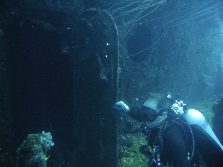 Diver Dave C. at the door of the Saratoga's radio room