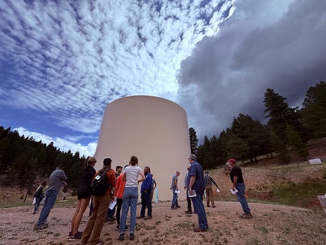 a group tours a wells and springs system and water plant