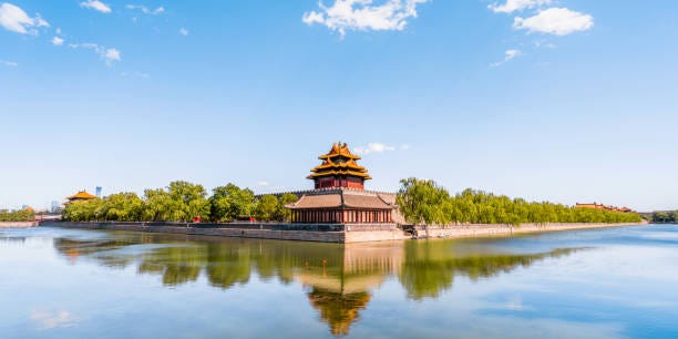 Sunny Scenery of the Corner Tower of the Forbidden City in Beijing, China Sunny Scenery of the Corner Tower of the Forbidden City in Beijing, China forbidden city moat stock pictures, royalty-free photos & images