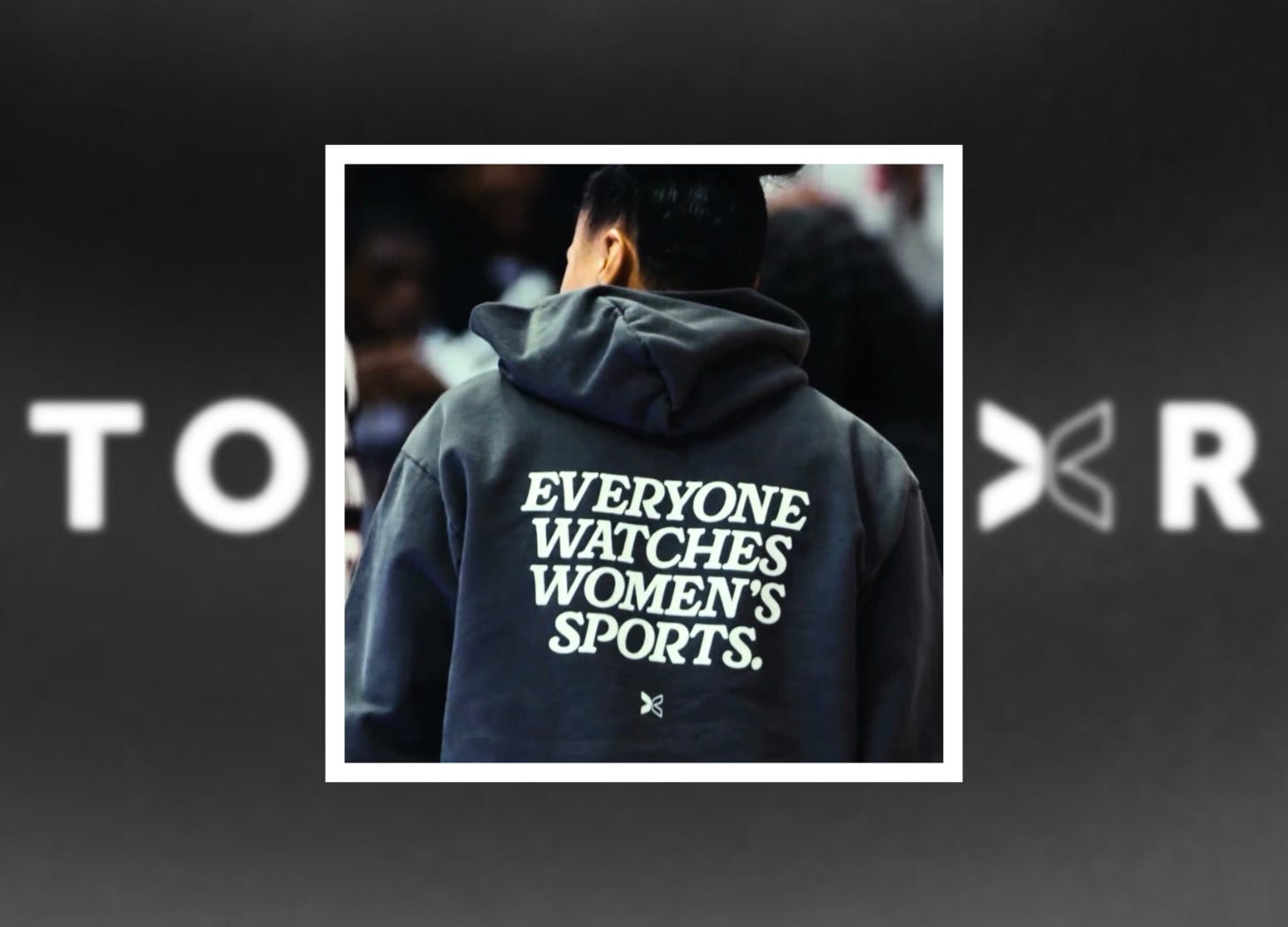 Dawn Staley wearing EWWS sweatshirt.