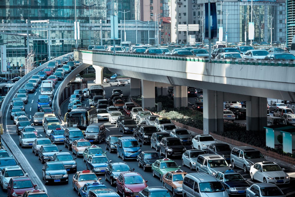 A traffic jam on a busy highway

Description automatically generated