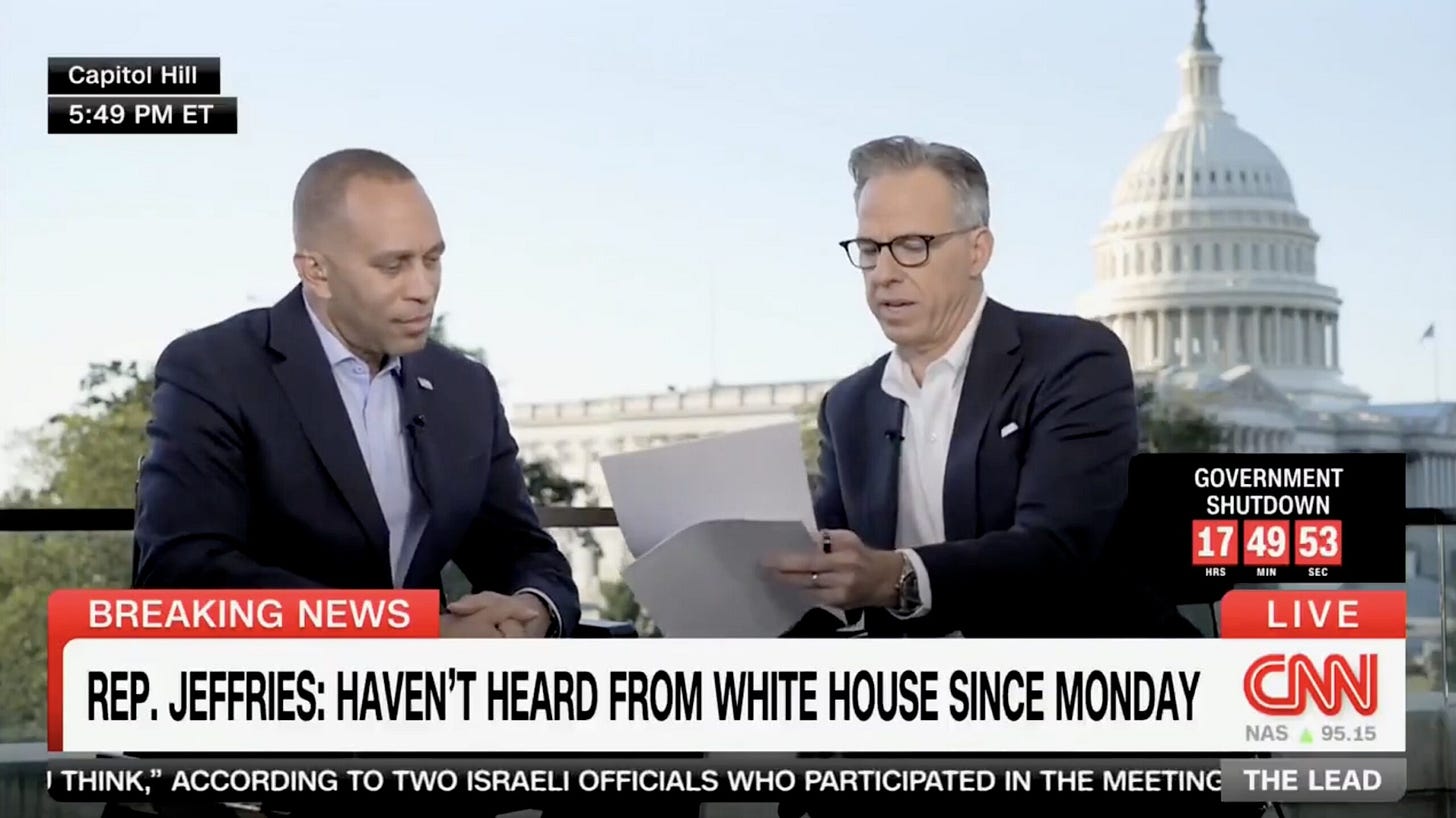 CNN anchors discuss breaking news regarding Rep. Jeffries and government shutdown updates at Capitol Hill, with the U.S. Capitol building in the background.