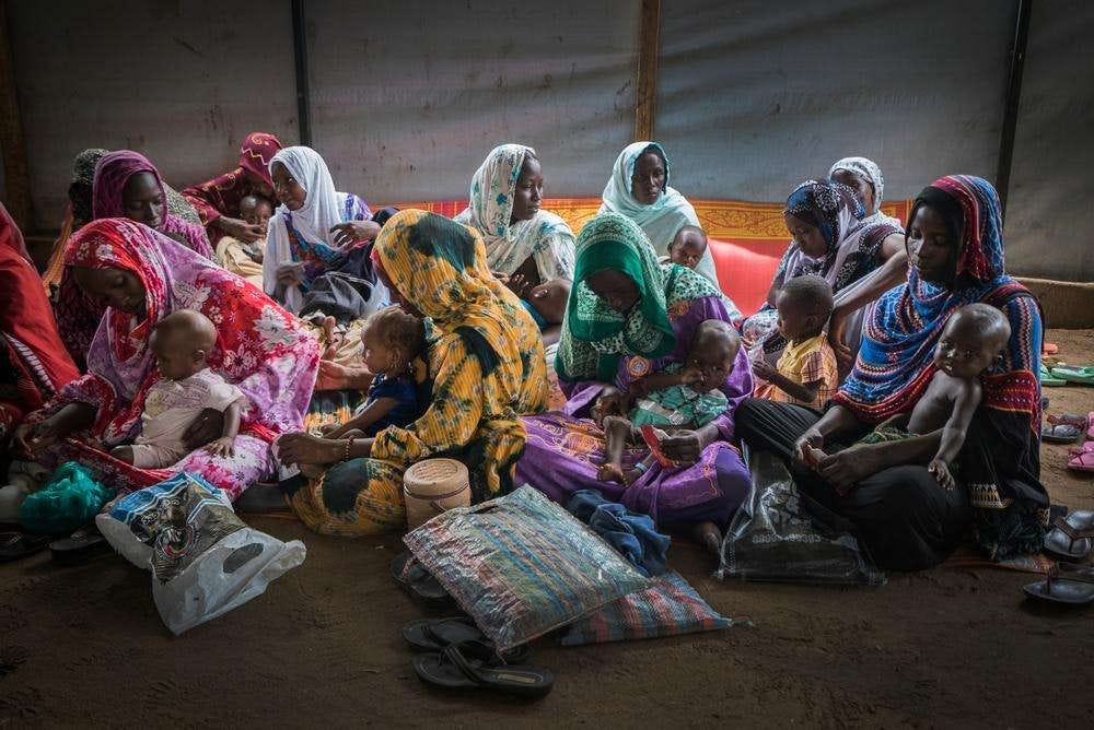 Displaced families sheltering together.