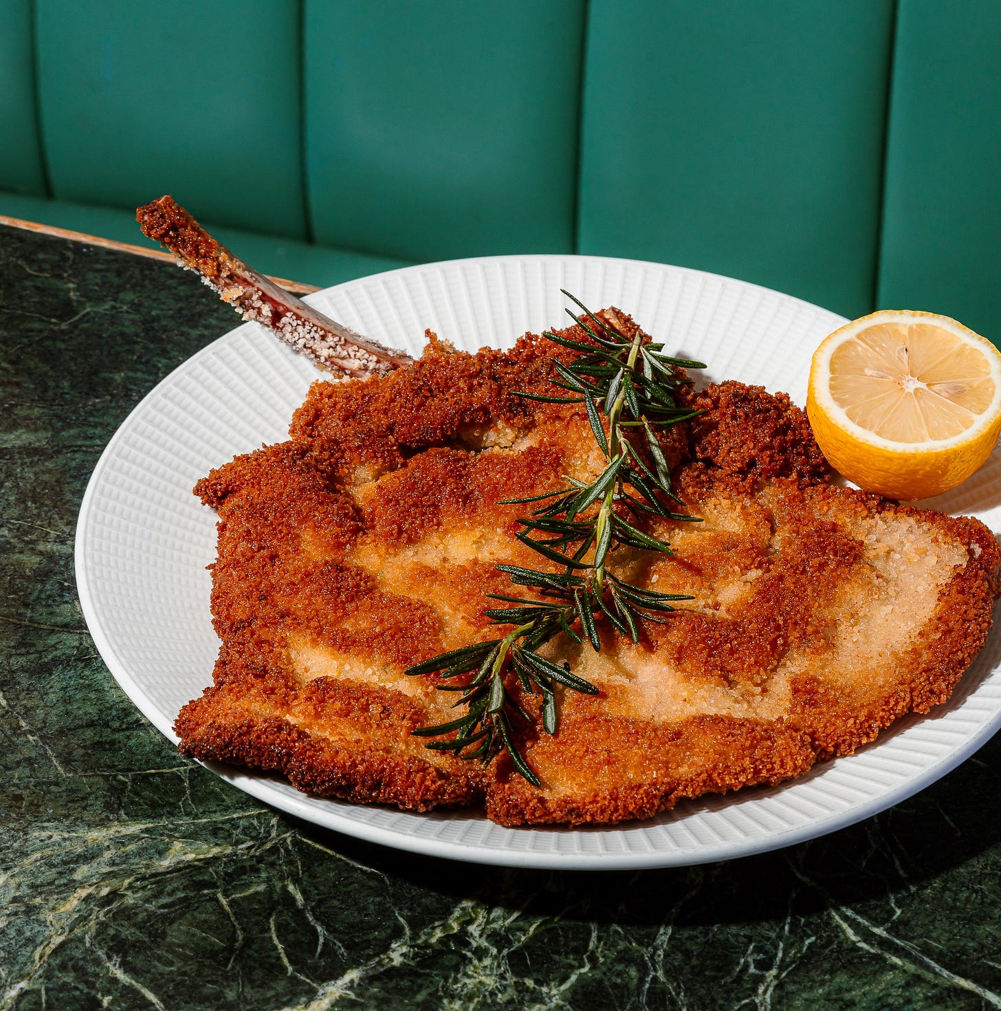 Cotoletta on a plate. Cotoletta on a plate.