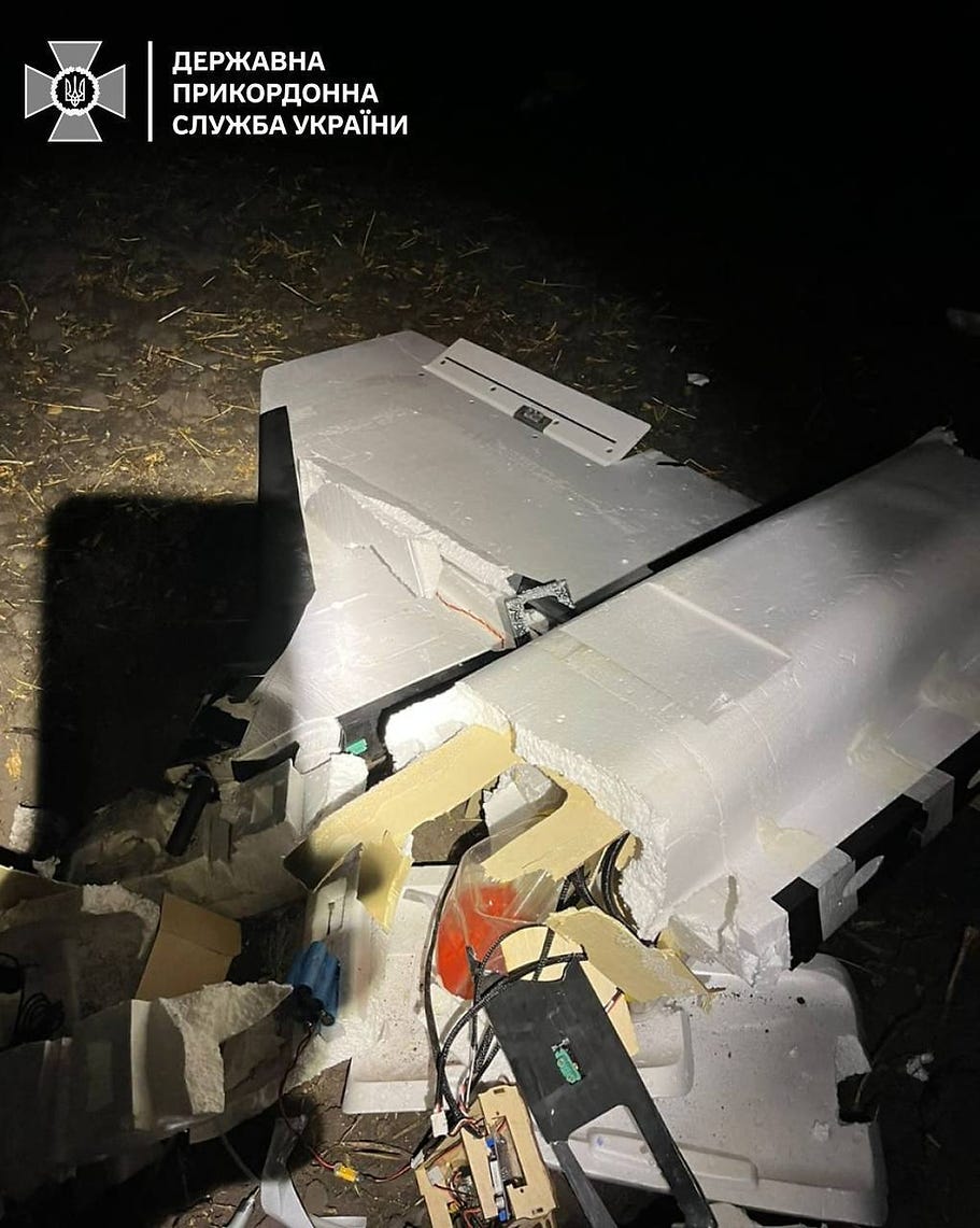 Wreckage of a Gerbera decoy drone. Note the plywood and foam construction of the airframe. Such construction practices result in a very low unit cost and facilitate a very high rate of production. Wreckage of a Gerbera decoy drone. Note the plywood and foam construction of the airframe. Such construction practices result in a very low unit cost and facilitate a very high rate of production.