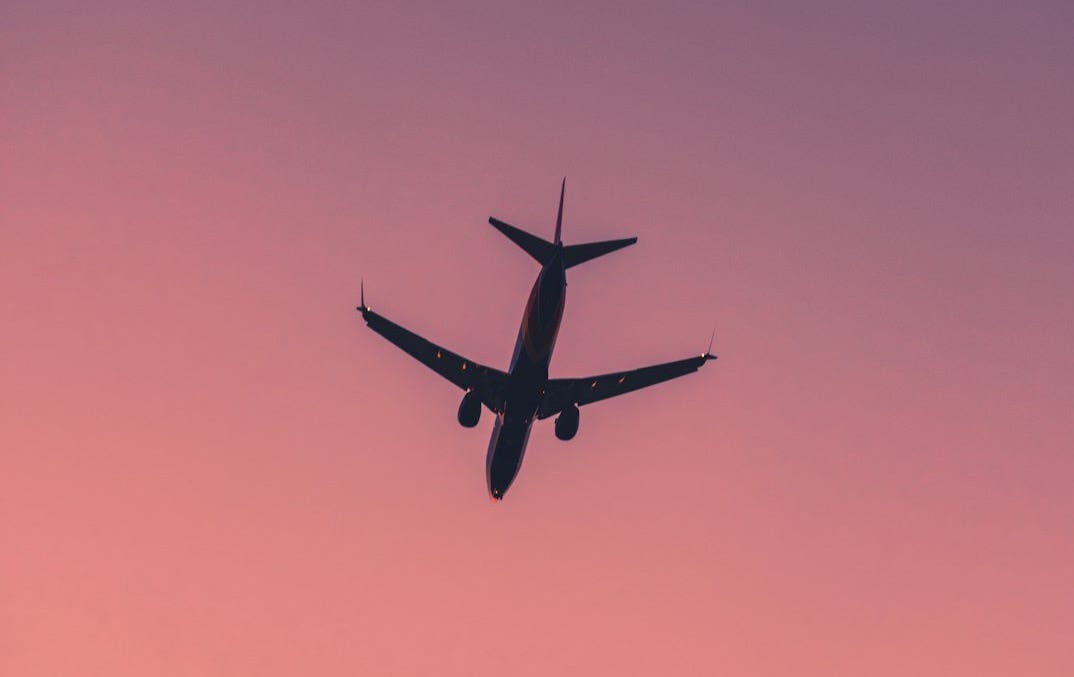 airplane flying in the sky during daytime airplane flying in the sky during daytime