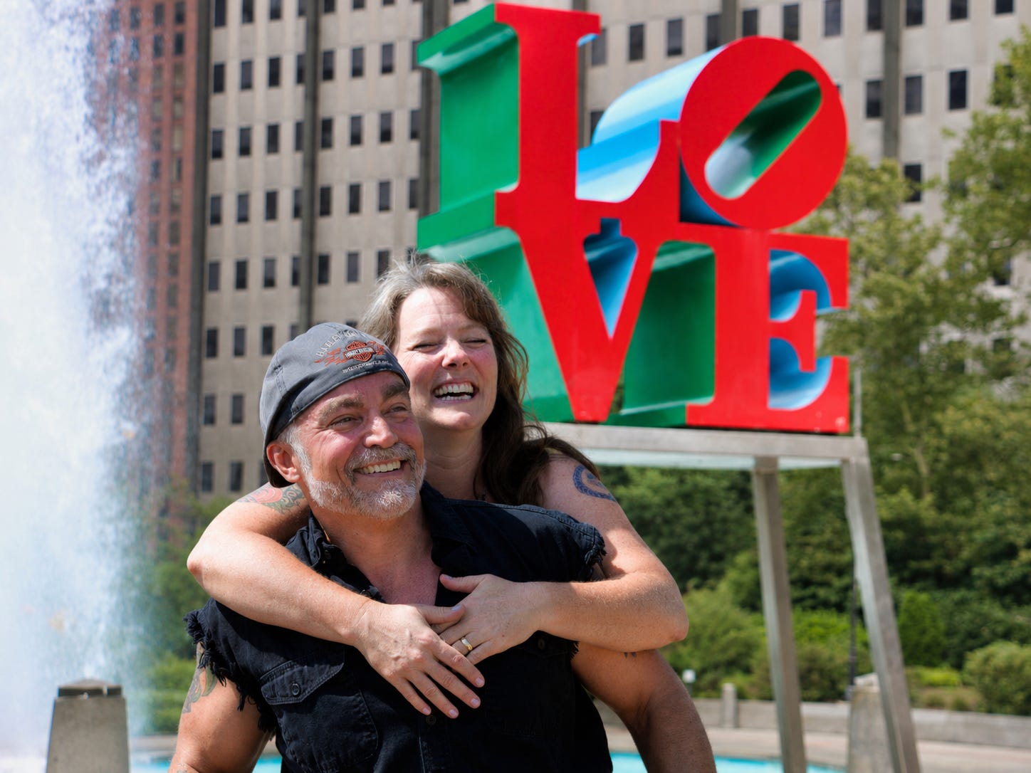 Scotte and Toni beneath the LOVE sculpture in Philadelphia’s LOVE Park.