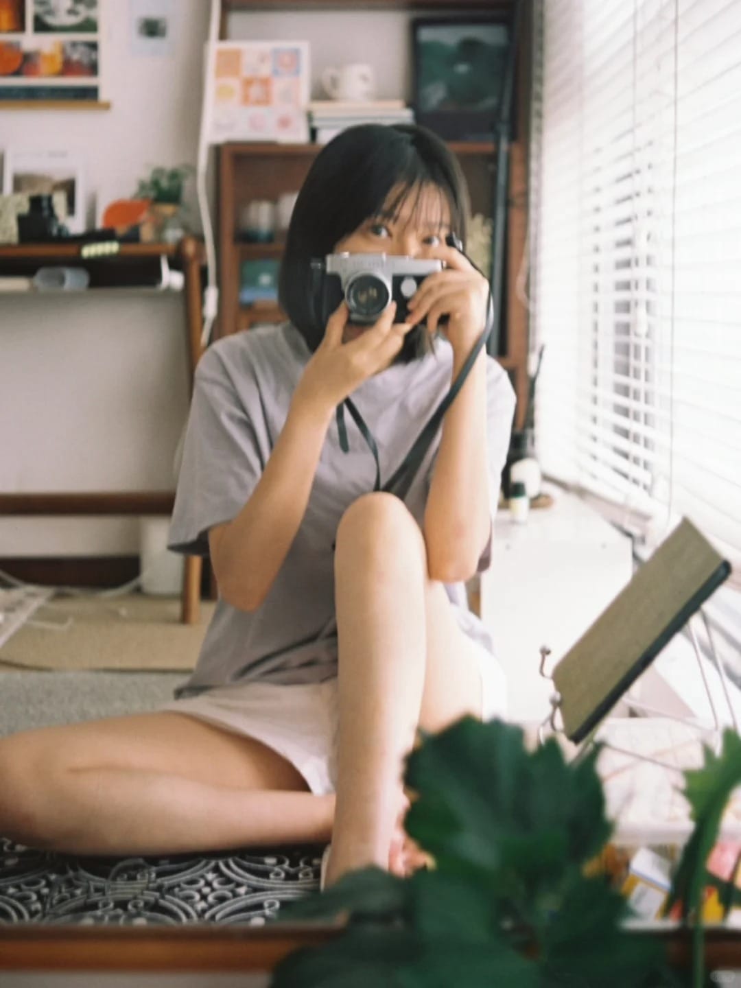 她和她的胶片相机