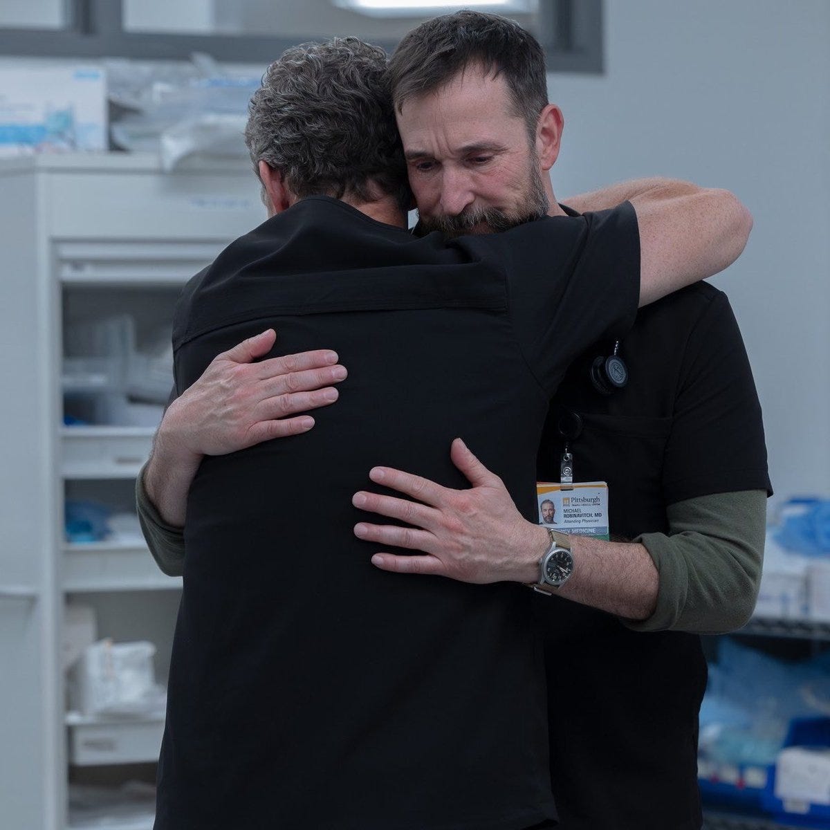 the hug being the inverse of the other; robby initiating it — jack  intiating it poetry