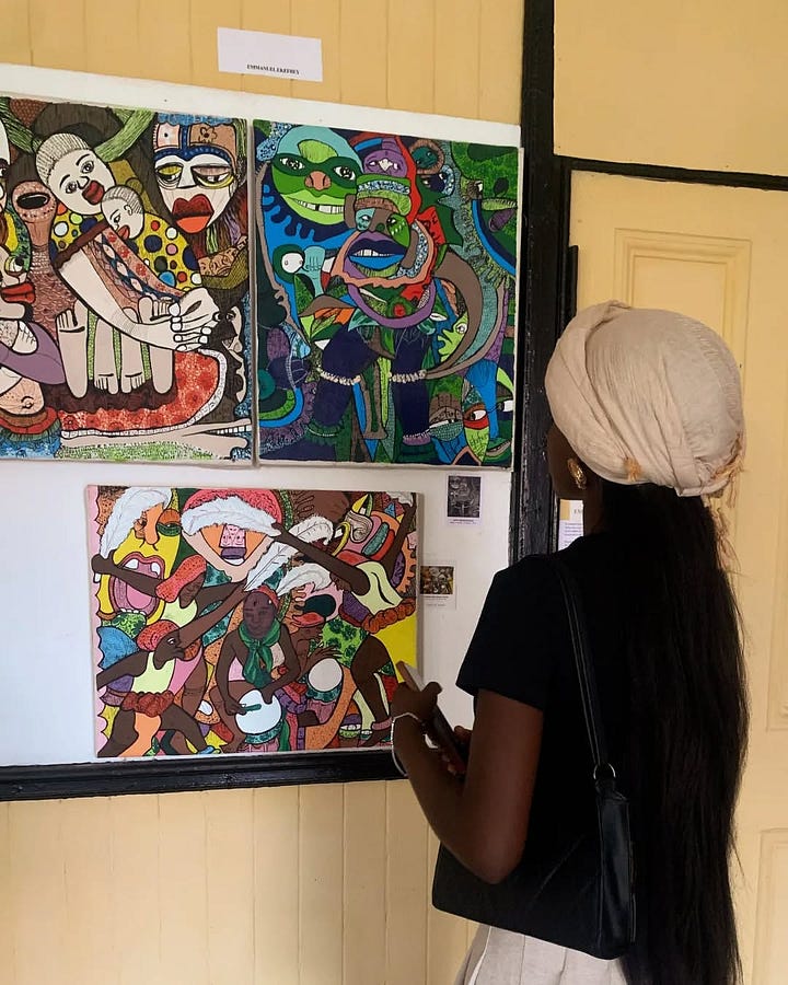 Photos of myself at the first (L) and second (R) editions of the Traces of Time Calabar Exhibition in 2023 and 2024, respectively.