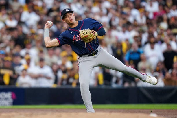 Gio Urshela of the Atlanta Braves throws to first base during Game 2 of the Wild Card Series presented by T-Mobile 5G Home Internet between the...