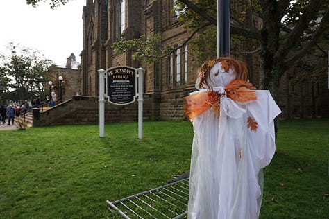 Scarecrows wear old clothing, colourful accessories, and funny expressions on their faces as they stand propped up against lampposts and other landmarks in Charlottetown.