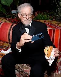 Spotted: Cinema's grand storyteller Steven Spielberg turning his  directorial gaze upon an In-N-Out burger at the Vanity Fair Oscar Party.  This moment of pure, unscripted joy blurs the lines between everyday life
