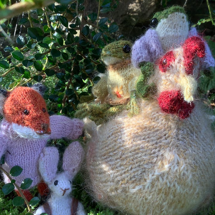 Soft toys hiding in the bushes