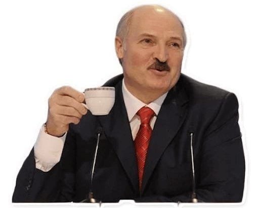 This may contain: a man in a suit and tie holding a cup This may contain: a man in a suit and tie holding a cup