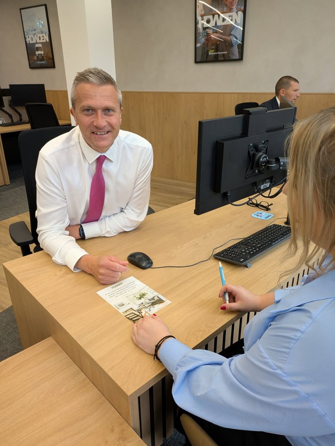 May be an image of 3 people, people studying, newsroom and text