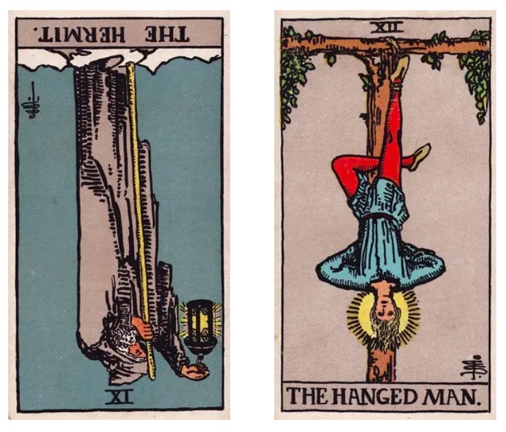 the Hermit tarot card reversed and the Hanged Man tarot card upright