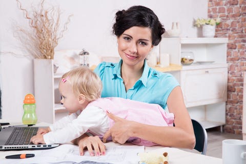You can never have too many images of women attempting to type around babies. You can never have too many images of women attempting to type around babies.