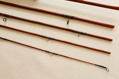 A custom 4wt fiberglass fishing rod with styling inspired by a 1970s Ford Bronco.