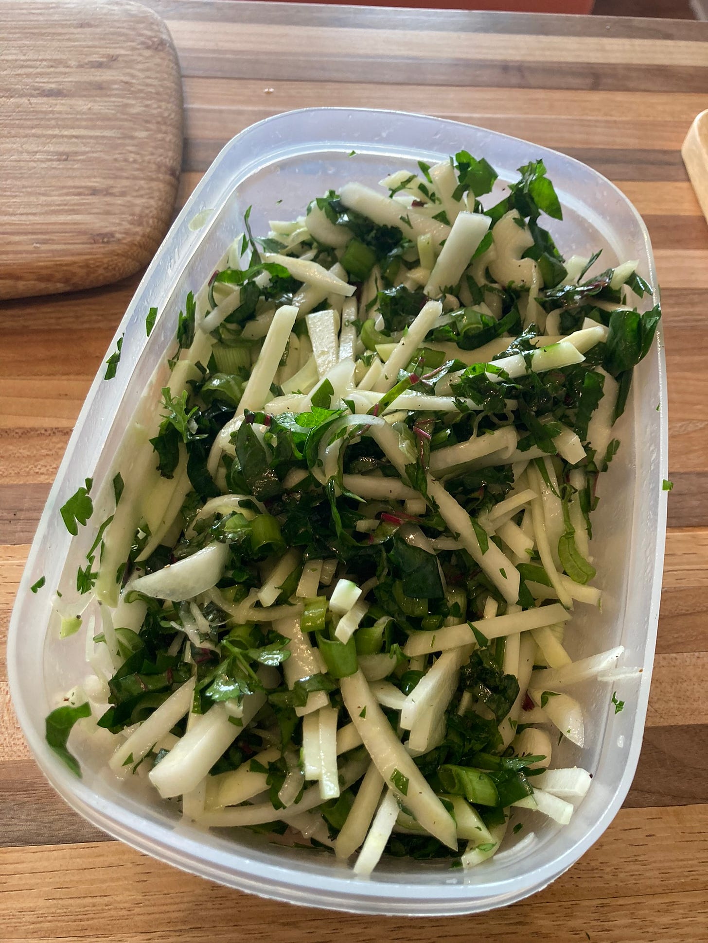 A very green salad with kohlrabi match sticks