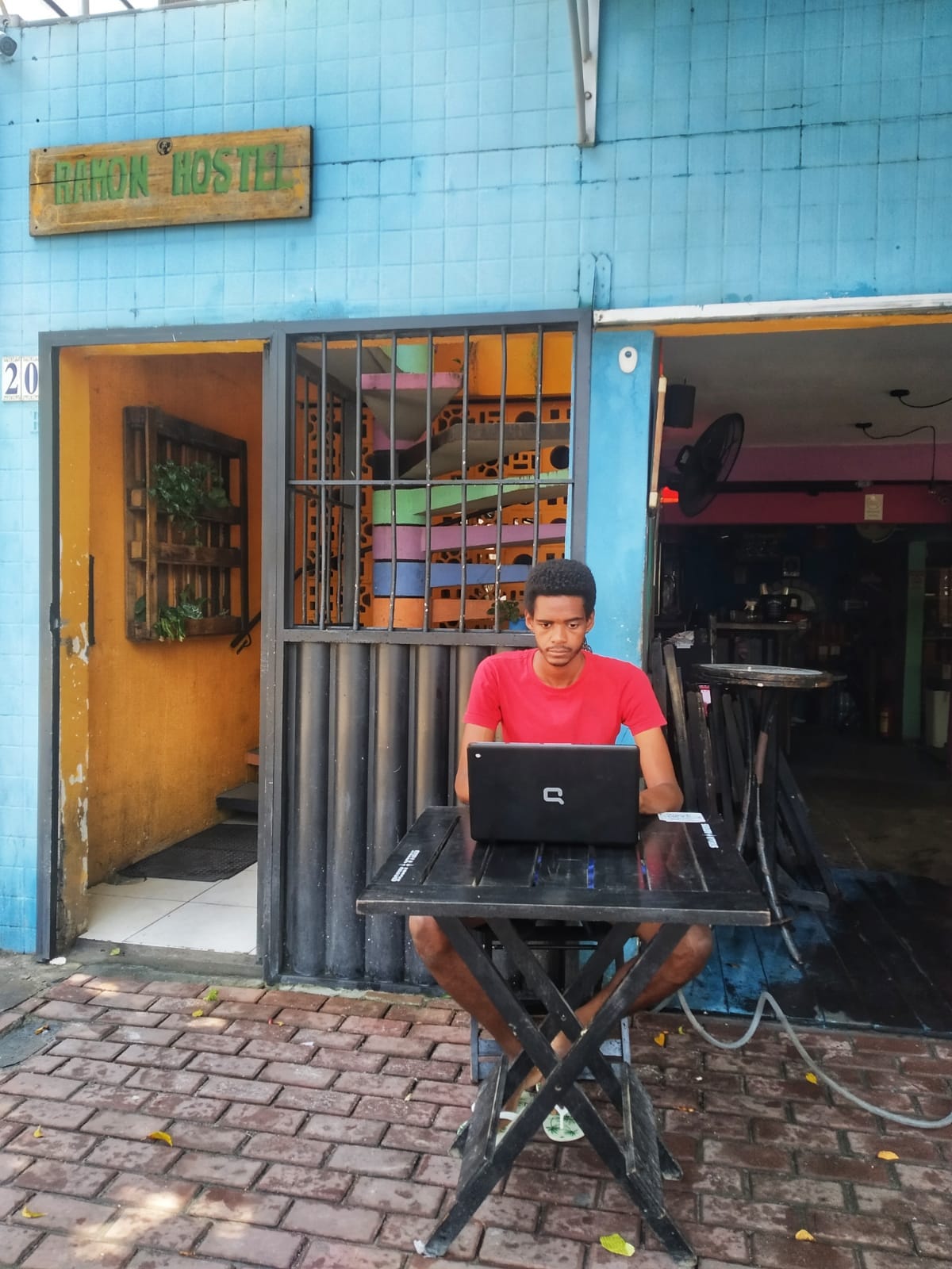 Yuri, remoting working at a hostel in Recife, Brazil