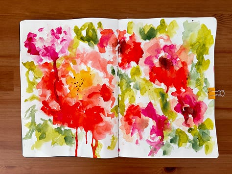 Abstract watercolour flowers in a sketchbook