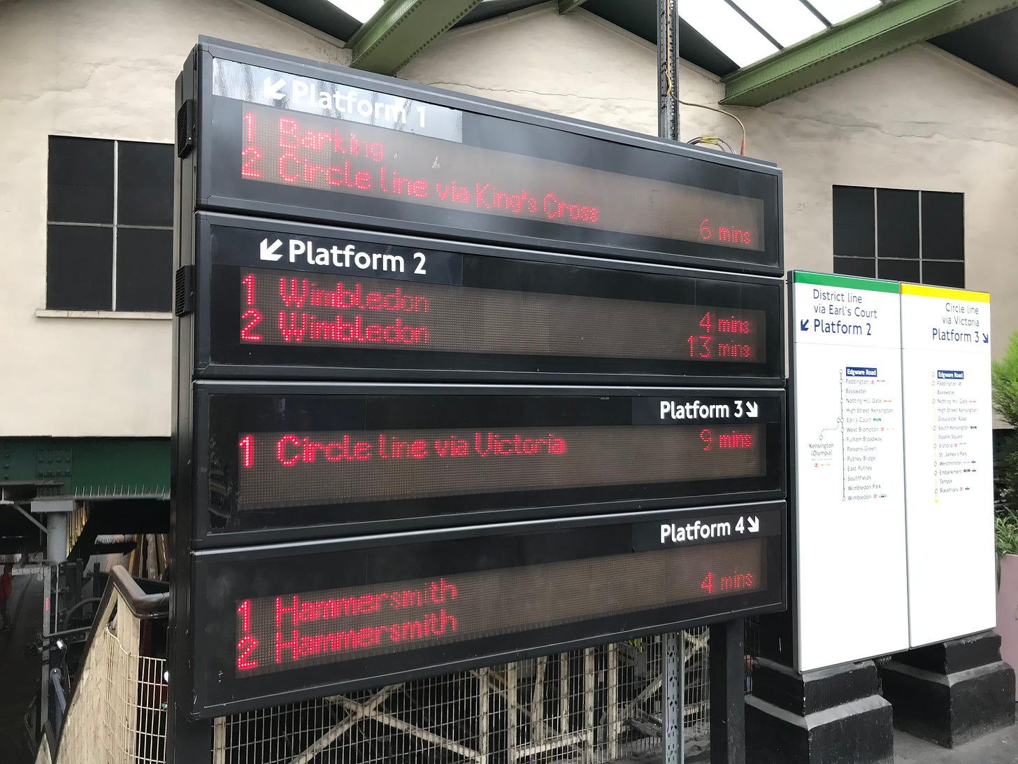 Photo showing next train screens in station entrance at Edgware Road. Photo showing next train screens in station entrance at Edgware Road.