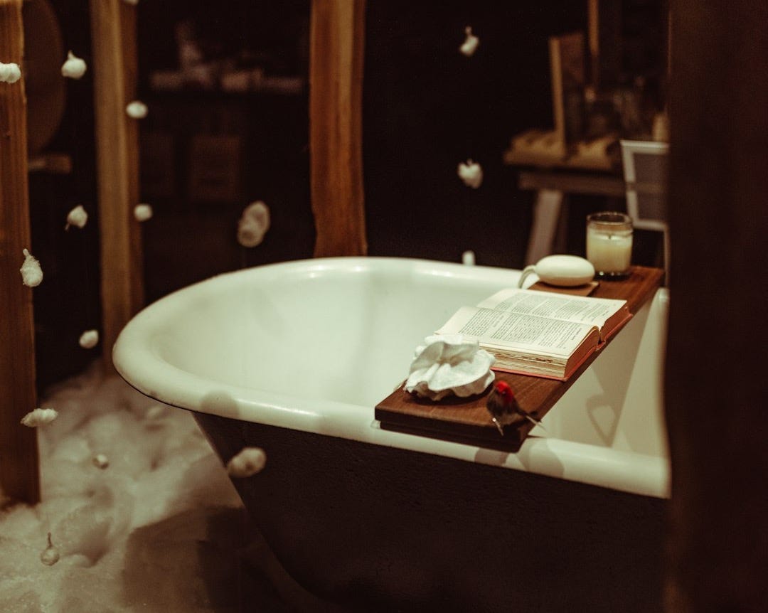 white ceramic bathtub with white ceramic bathtub