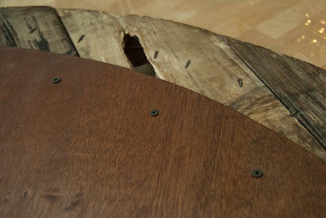 Black screws under table