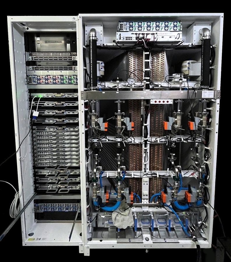 An image of an open server rack showcasing an intricate setup of hardware components, including multiple server units, cables, cooling systems, and various technical equipment.