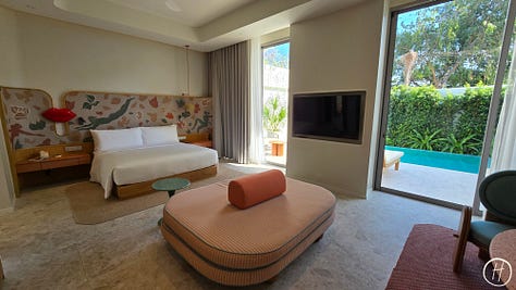 Deluxe One Bedroom Suite with Private Pool: The Bedroom and Living area