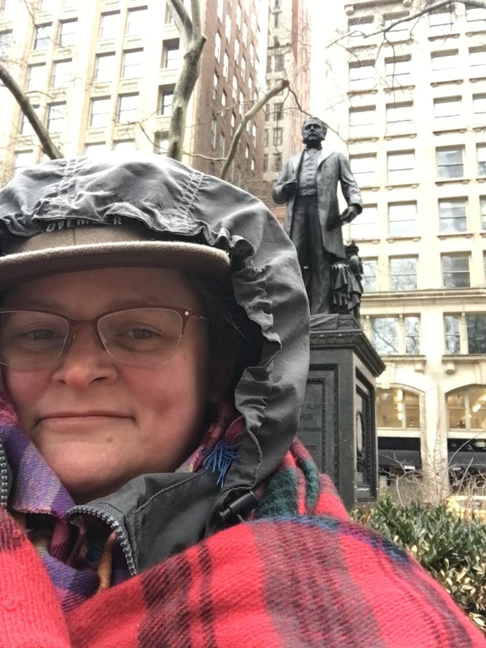 May be an image of 1 person, monument and outdoors