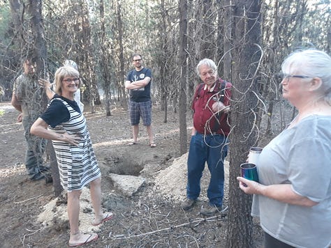 Site of Pookie's funeral. Ken is the one in the red shirt.