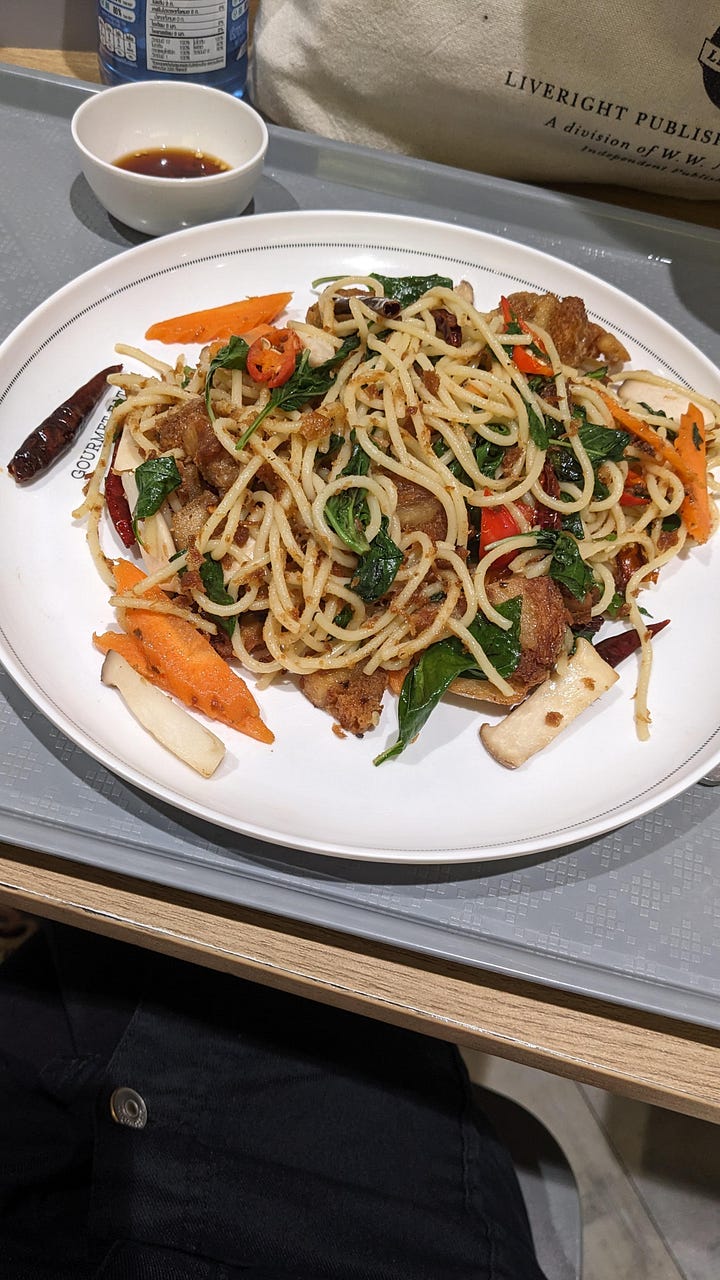 2 bowls of thai spicy spaghetti: one ordered, one menu visual