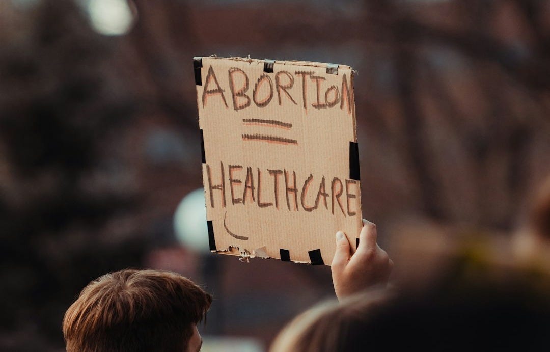 a man holding a sign a man holding a sign
