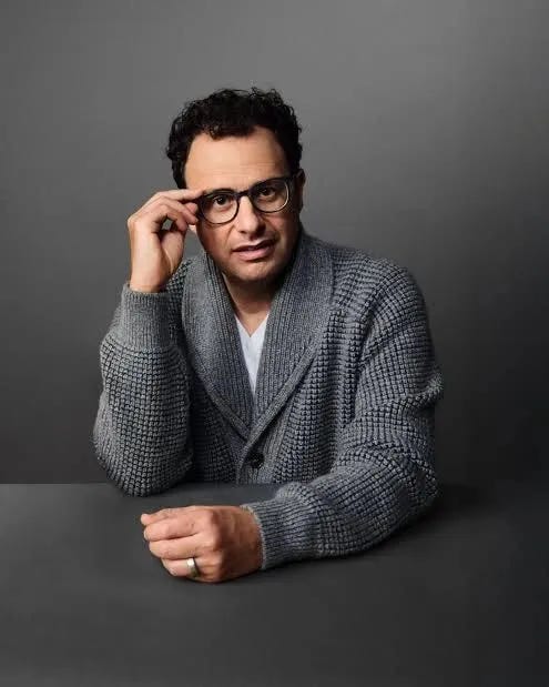 Studio portrait of Dario Amodei, co-founder and CEO of Anthropic, who left OpenAI in 2021 as research director to co-found Anthropic with his sister Daniela Amodei, with Anthropic now approaching a $1 trillion valuation in May 2026 after growing annualized revenue from $1 billion at end of 2024 to $30 billion in April 2026 and projecting $45 billion in coming weeks, surpassing OpenAI on revenue while spending 4x less on compute and positioning Dario as the operator who quietly won the AI race after walking out of the company he helped build.