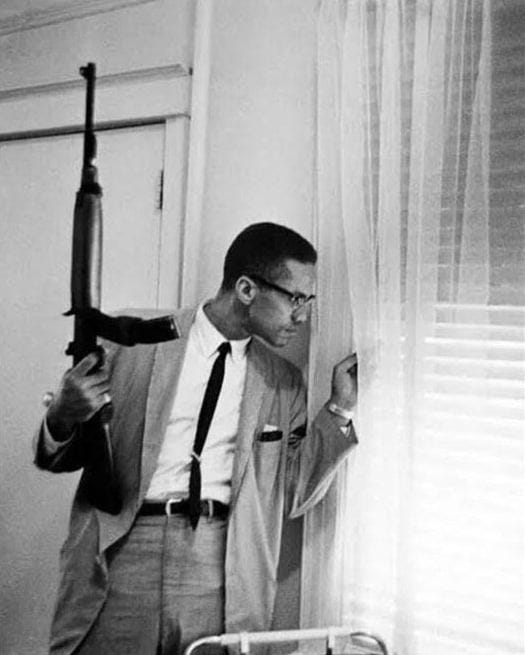 Life magazine captured Malcolm X holding an M1 Carbine in March 1964, following death threats from the Nation of Islam after he exposed Elijah Muhammed. Life magazine captured Malcolm X holding an M1 Carbine in March 1964, following death threats from the Nation of Islam after he exposed Elijah Muhammed.