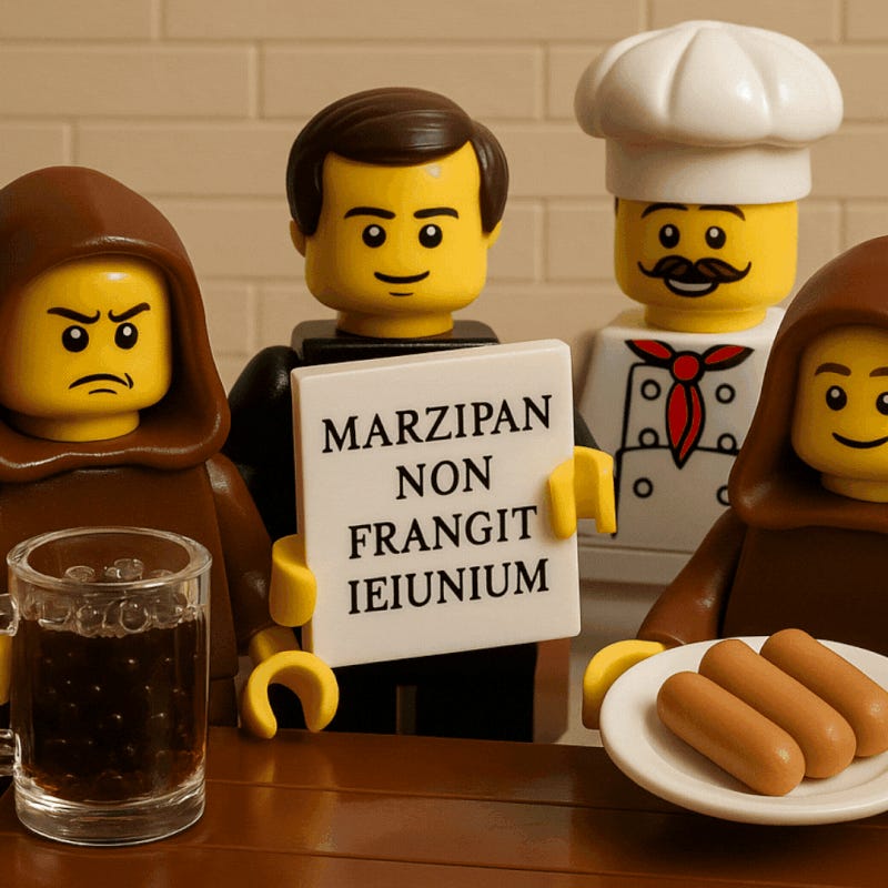 Four lego people dressed in brown with one holding a beer tankard, one with a plate of frankfurters and one holding a sign that reads ‘Marzipan Non Frangit Ieiunium’.