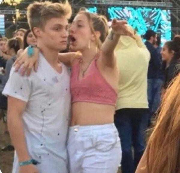 Girl yelling at disinterested boy