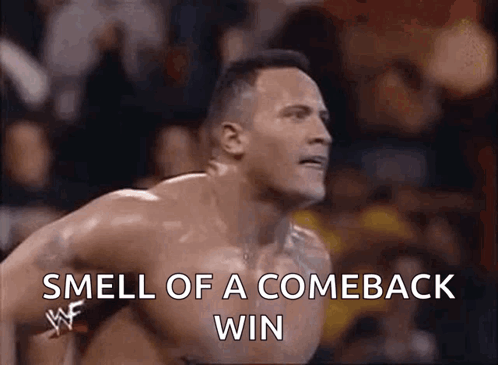 a man without a shirt is jumping in the air with the words `` smell of a comeback win '' above him .