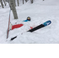 crashed skier in snow