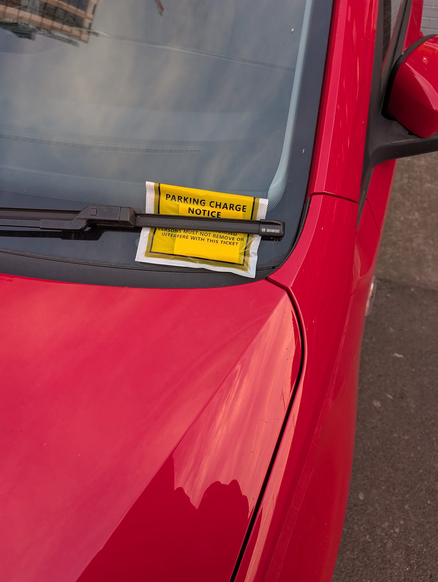 car with parking ticket