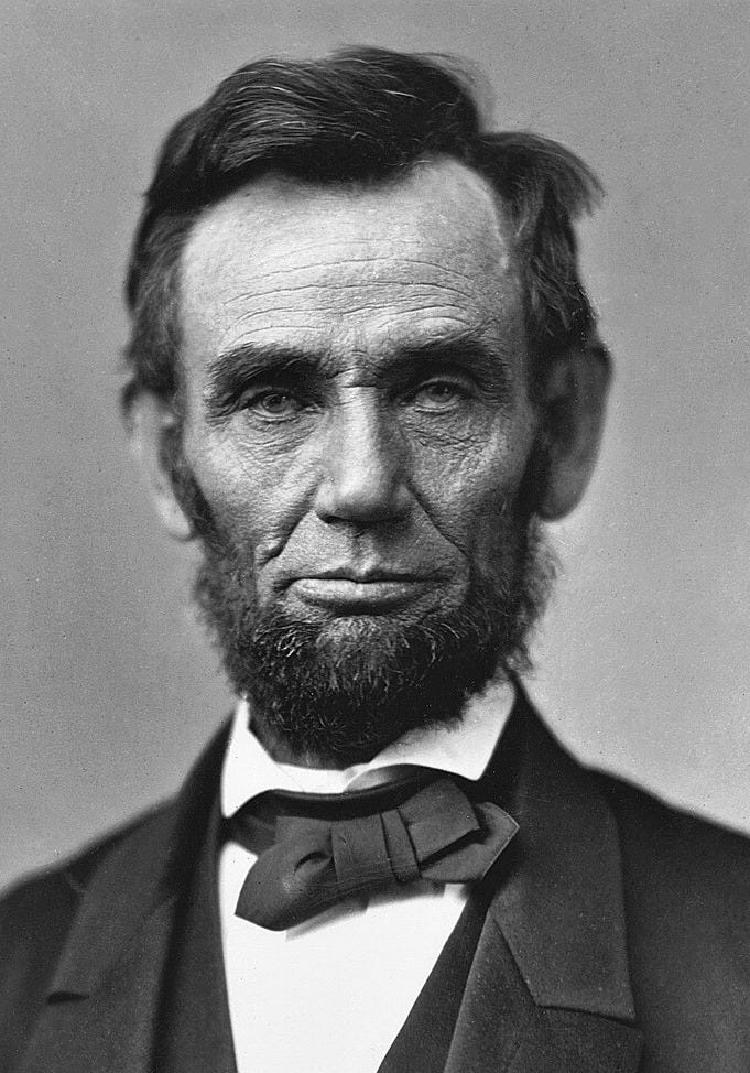 A bearded Abraham Lincoln showing his head and shoulders