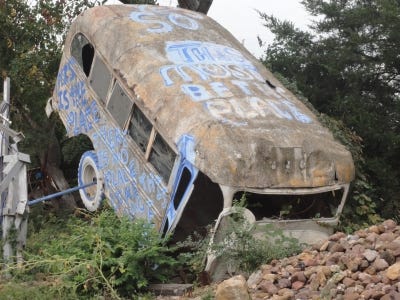 Bushenge Crazy Topeka dude burying cars as monuments