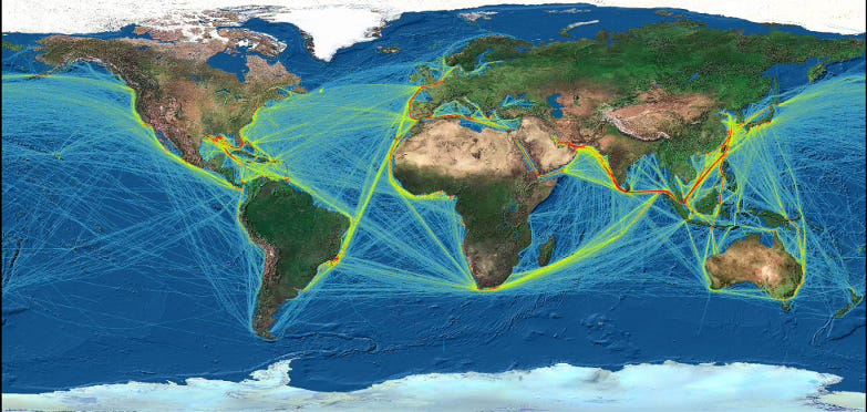 a color global map in primary colors. The land masses are browns and green while the oceans are deep blue in color. International shipping lanes are depicted in thin yellow lines which become thicker and more bolded as the density of the shipping increases. 