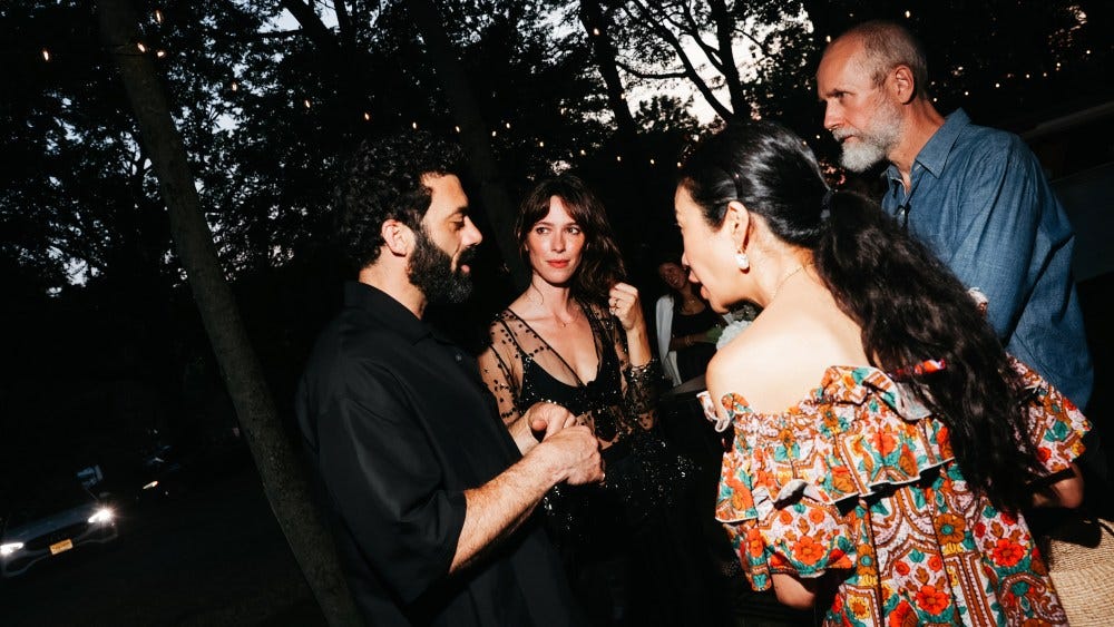 Morgan Spector and Rebecca Hall at a Net-a-porter party in the Hamptons last summer.